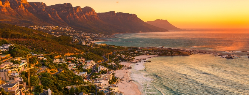 A wide picture of Clifton Beach in Cape Town, South Africa at late afternoon in a beautiful sunset. Colorful and satured taken with a Canon 6D.