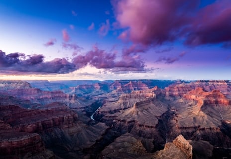 Sweeping view of the Grand Canyon at dusk.