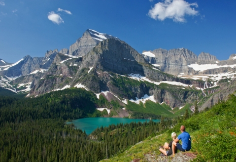 Young Couple enjoying the view in Glacier National Park in northern Montana